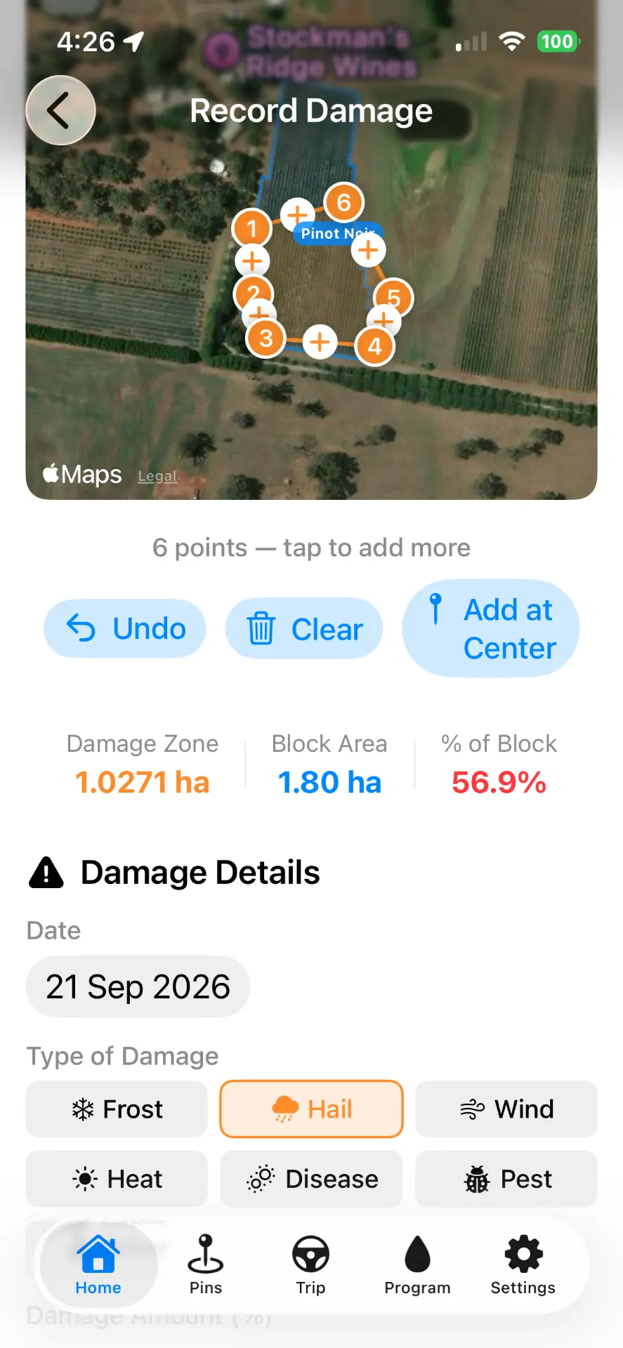 VineTrack mobile damage recording screen showing a satellite map with a pinned damage zone, damage zone area, block area and percent of block, with damage type selection for frost, hail, wind, heat, disease and pest