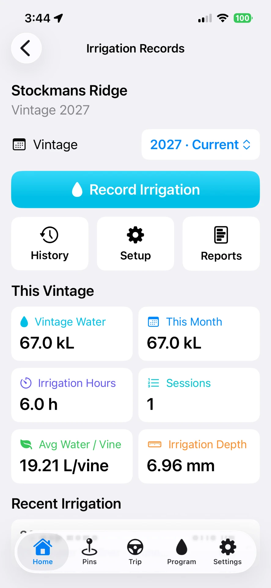 VineTrack mobile irrigation records screen showing vintage water applied, irrigation hours, sessions, average water per vine and irrigation depth with a Record Irrigation button